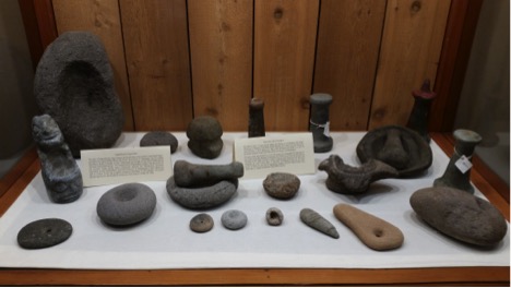 Photo: A. Holland One of the beautiful displays at the museum exhibiting mortars and pestles. 